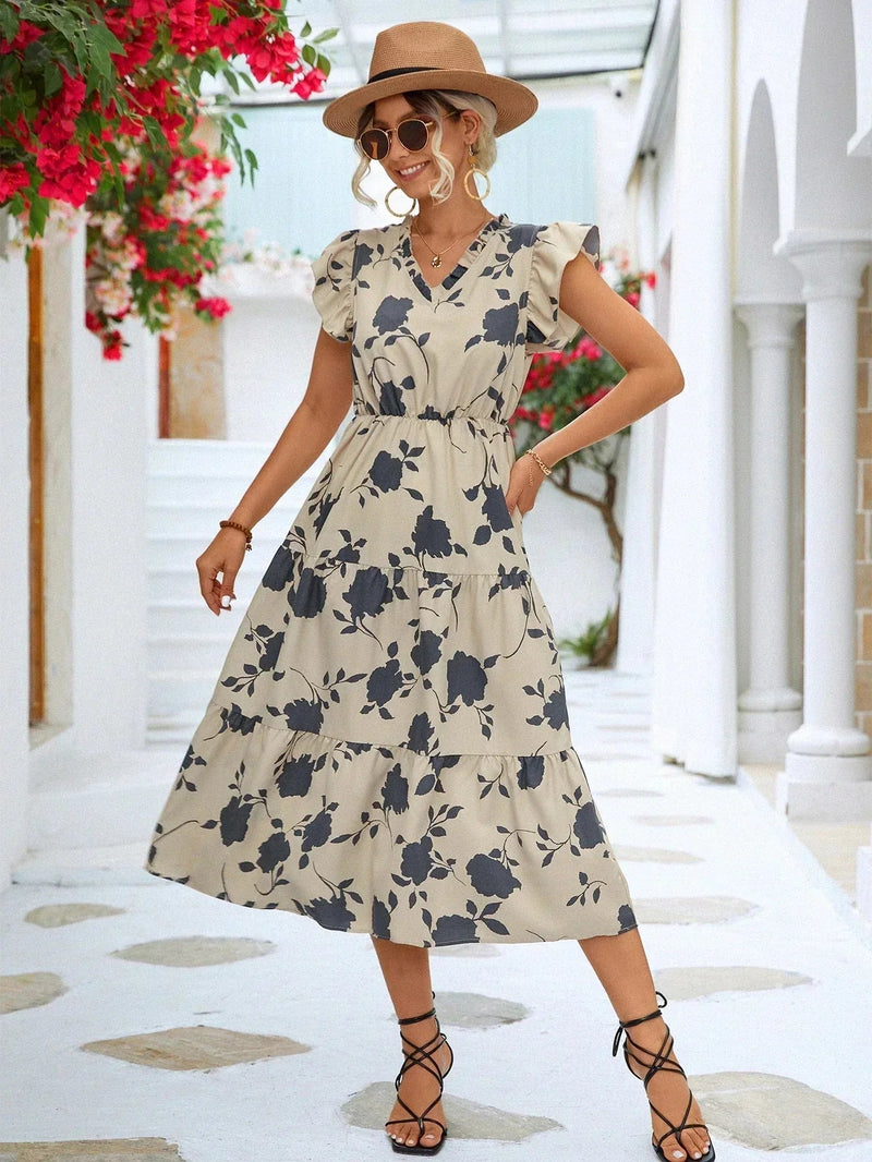 Renata – Feminin A formet kjole med blødt blomsterprint og V hals