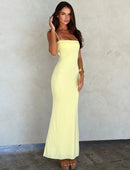 Clara – Tætsiddende maxikjole med spaghettistropper og blandede mønstre